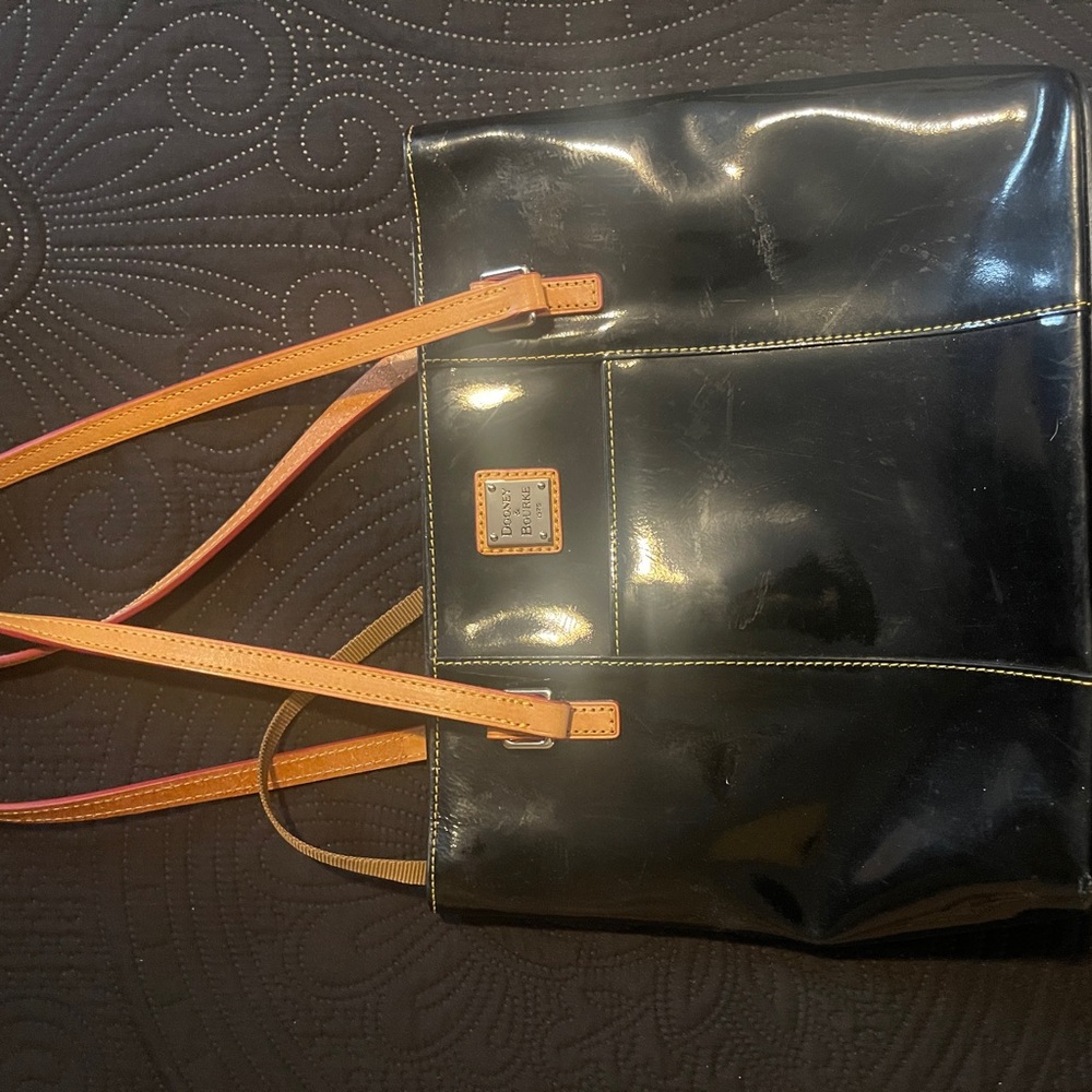 Dooney & Bourke Black and Tan Leather Tote with Sleek Design